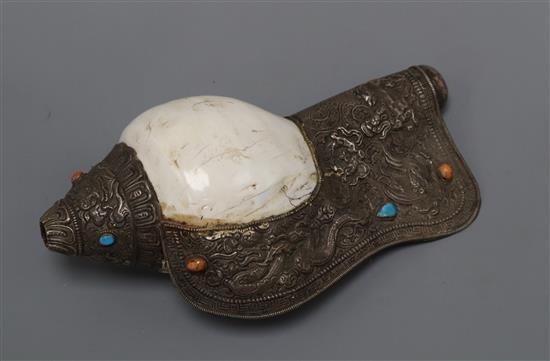 A Tibetan mounted conch shell